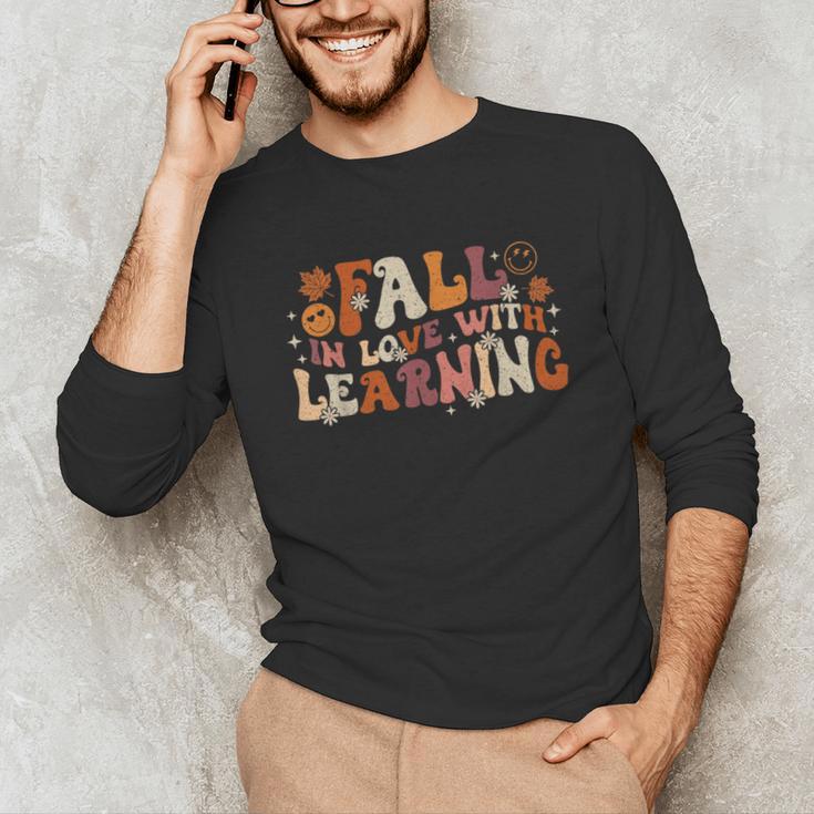 Fall In Love With Learning Autum Thanksgiving Teacher Kids Unisex Long Sleeve T-Shirt, funny gift