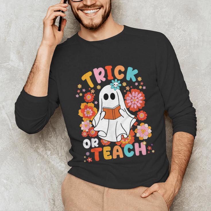 Groovy Halloween Trick Or Teach Retro Floral Ghost Teacher For Men Women Kids Unisex Long Sleeve T-Shirt, funny gift Groovy Halloween Trick Or Teach Retro Floral Ghost Teacher For Men Women Kids Unisex Long Sleeve T-Shirt, funny gift