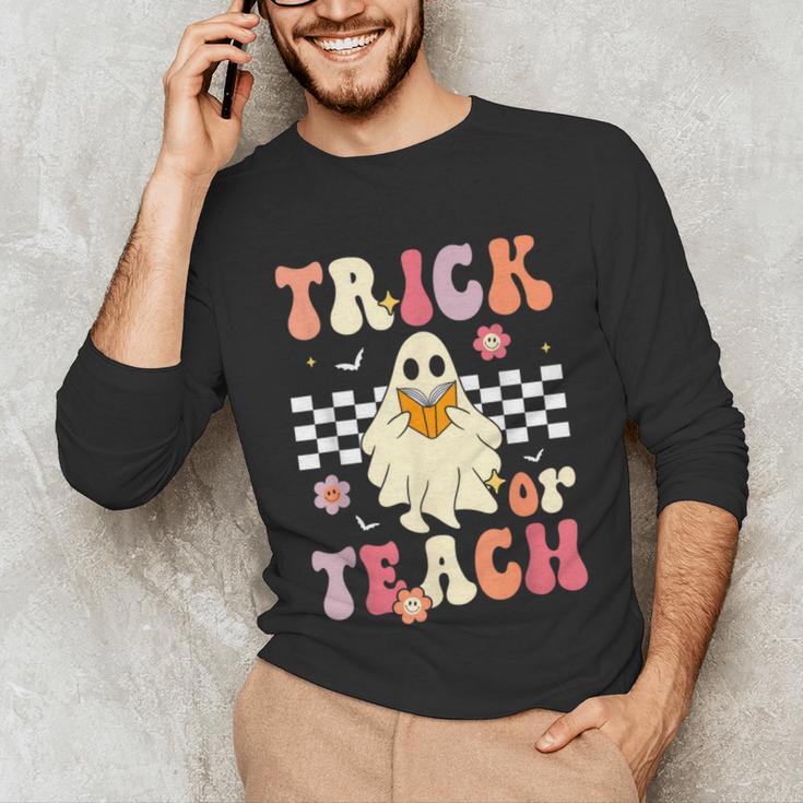 Groovy Teacher Halloween Retro Trick Or Teach Floral Ghost Unisex Long Sleeve T-Shirt, funny gift Groovy Teacher Halloween Retro Trick Or Teach Floral Ghost Unisex Long Sleeve T-Shirt, funny gift