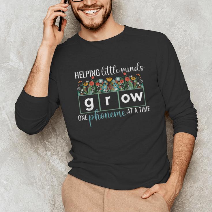 Helping Little Minds Grow One Phoneme At A Time Teacher Unisex Long Sleeve T-Shirt, funny gift Helping Little Minds Grow One Phoneme At A Time Teacher Unisex Long Sleeve T-Shirt, funny gift
