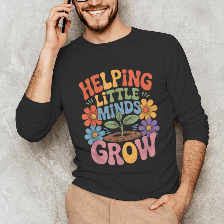 Helping Little Minds Grow Teacher First Day Back To School Unisex Long Sleeve T-Shirt, funny gift Helping Little Minds Grow Teacher First Day Back To School Unisex Long Sleeve T-Shirt, funny gift