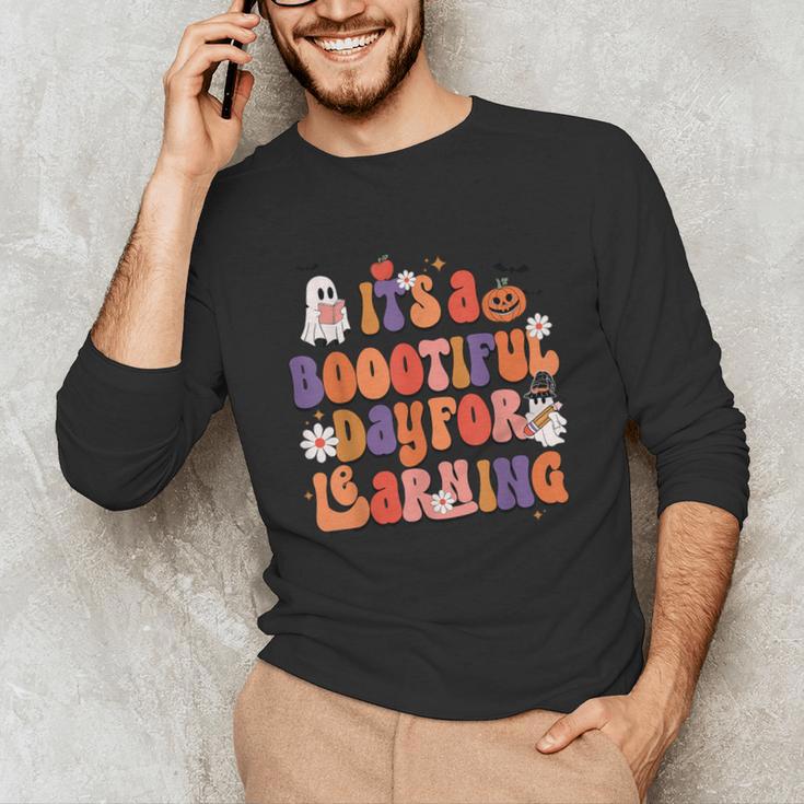 It's A Bootiful Day For Learning Cute Teacher Halloween Unisex Long Sleeve T-Shirt, funny gift It's A Bootiful Day For Learning Cute Teacher Halloween Unisex Long Sleeve T-Shirt, funny gift