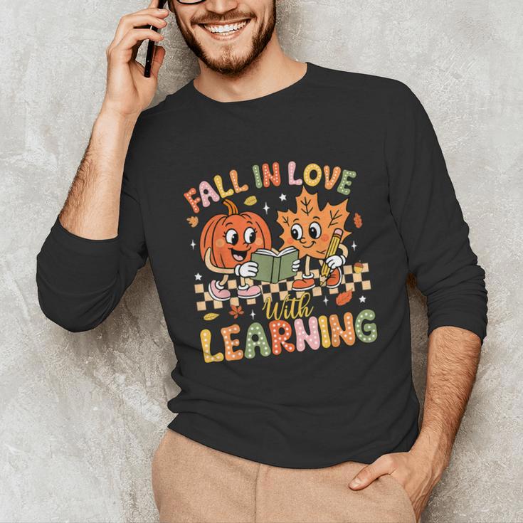 Retro Fall In Love With Learning Autumn Pumpkin Teacher Kids Unisex Long Sleeve T-Shirt, funny gift Retro Fall In Love With Learning Autumn Pumpkin Teacher Kids Unisex Long Sleeve T-Shirt, funny gift