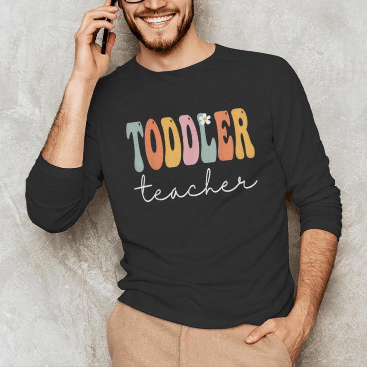 Toddler Teacher Retro Groovy Women Happy First Day Of School Unisex Long Sleeve T-Shirt, funny gift Toddler Teacher Retro Groovy Women Happy First Day Of School Unisex Long Sleeve T-Shirt, funny gift