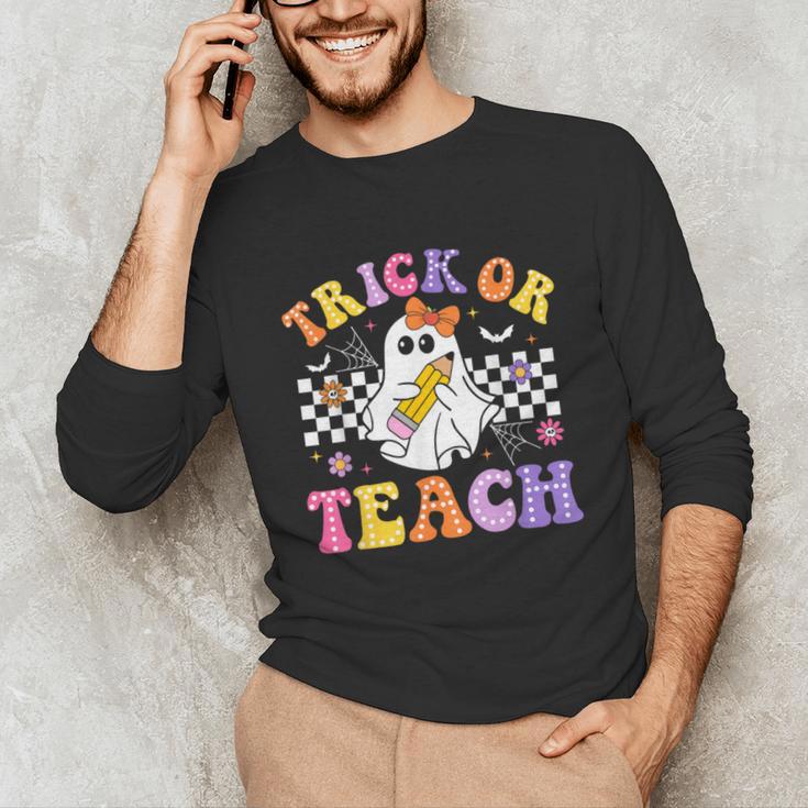 Trick Or Teach Groovy Halloween Teachers Unisex Long Sleeve T-Shirt, funny gift