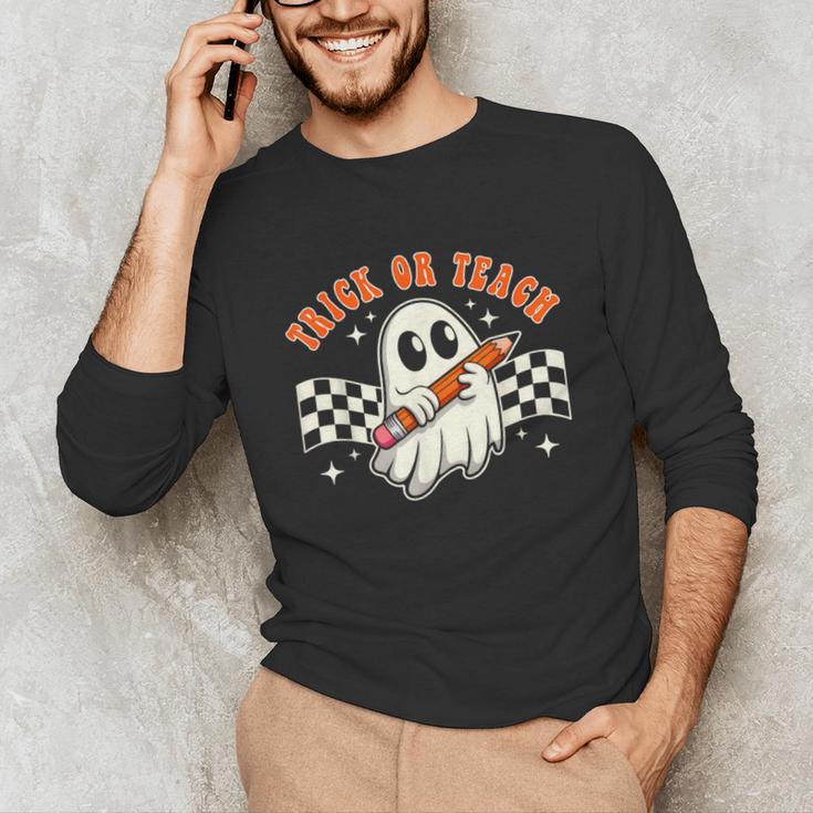 Trick Or Teach Groovy Retro Ghost Halloween Teacher Kids Unisex Long Sleeve T-Shirt, funny gift Trick Or Teach Groovy Retro Ghost Halloween Teacher Kids Unisex Long Sleeve T-Shirt, funny gift