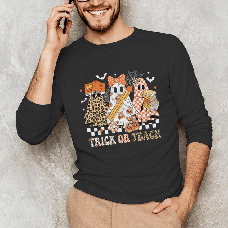 Trick Or Teach Groovy Teacher Halloween Floral Ghost Unisex Long Sleeve T-Shirt, funny gift Trick Or Teach Groovy Teacher Halloween Floral Ghost Unisex Long Sleeve T-Shirt, funny gift