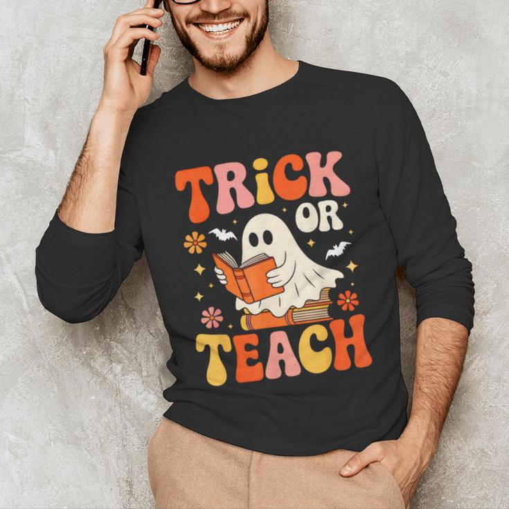 Trick Or Teach Halloween Shirt For Teacher Kids Floral Ghost Unisex Long Sleeve T-Shirt, funny gift