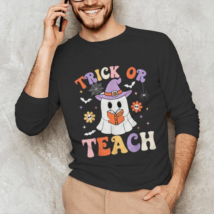 Trick Or Teach Teacher Groovy Ghost Halloween Teacher Unisex Long Sleeve T-Shirt, funny gift