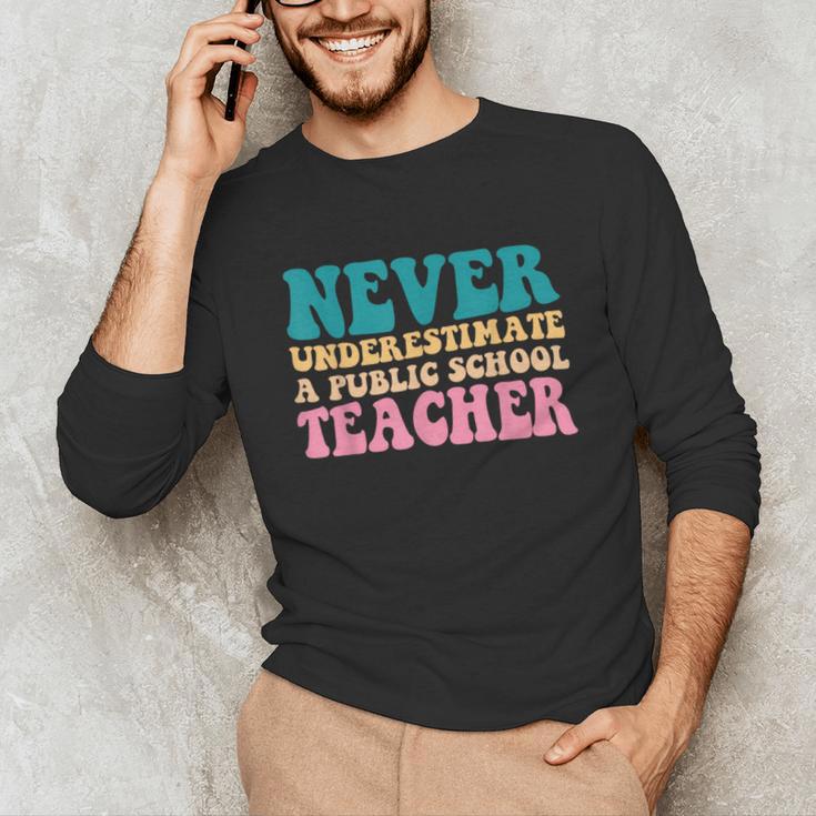 Never Underestimate A Public School Teacher Groovy Women Unisex Long Sleeve T-Shirt, funny gift Never Underestimate A Public School Teacher Groovy Women Unisex Long Sleeve T-Shirt, funny gift