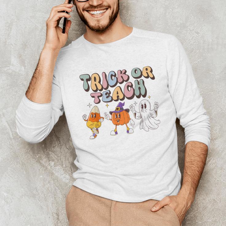 Trick Or Teach Candy Corn Pumpkin Ghost Teacher Unisex Long Sleeve T-Shirt, funny gift