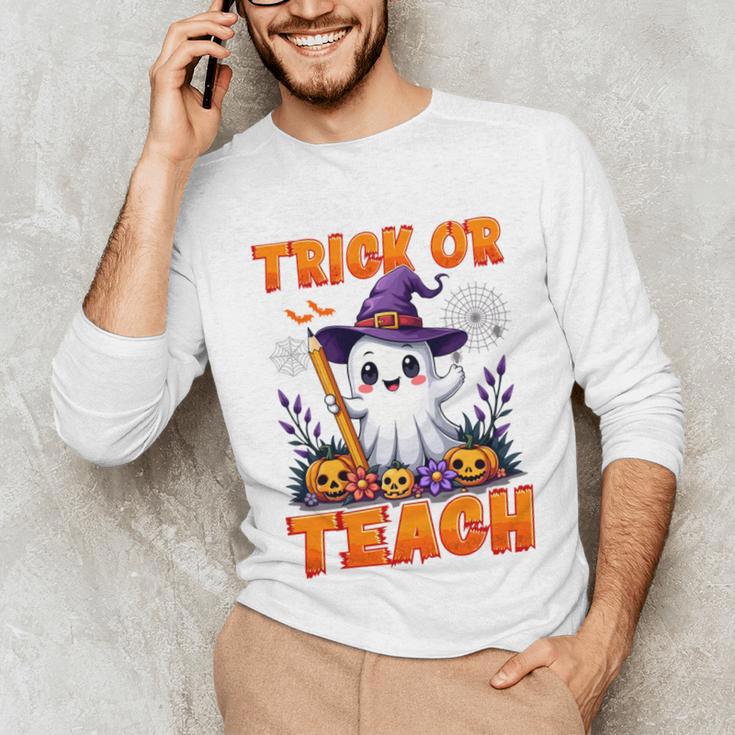 Trick Or Teach Teacher Halloween Ghost Pencil Floral Unisex Long Sleeve T-Shirt, funny gift Trick Or Teach Teacher Halloween Ghost Pencil Floral Unisex Long Sleeve T-Shirt, funny gift