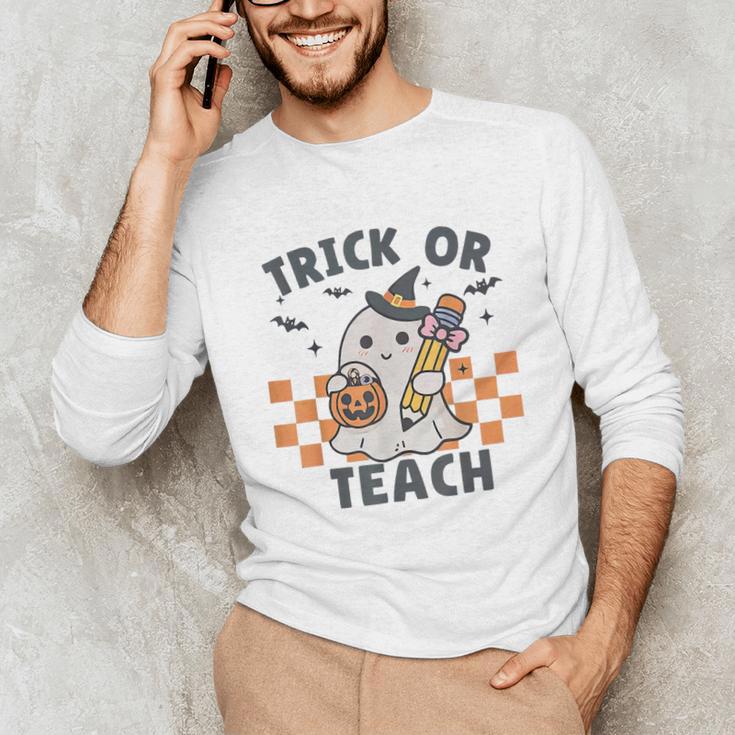 Trick Or Teach Teacher Unisex Long Sleeve T-Shirt, funny gift Trick Or Teach Teacher Unisex Long Sleeve T-Shirt, funny gift