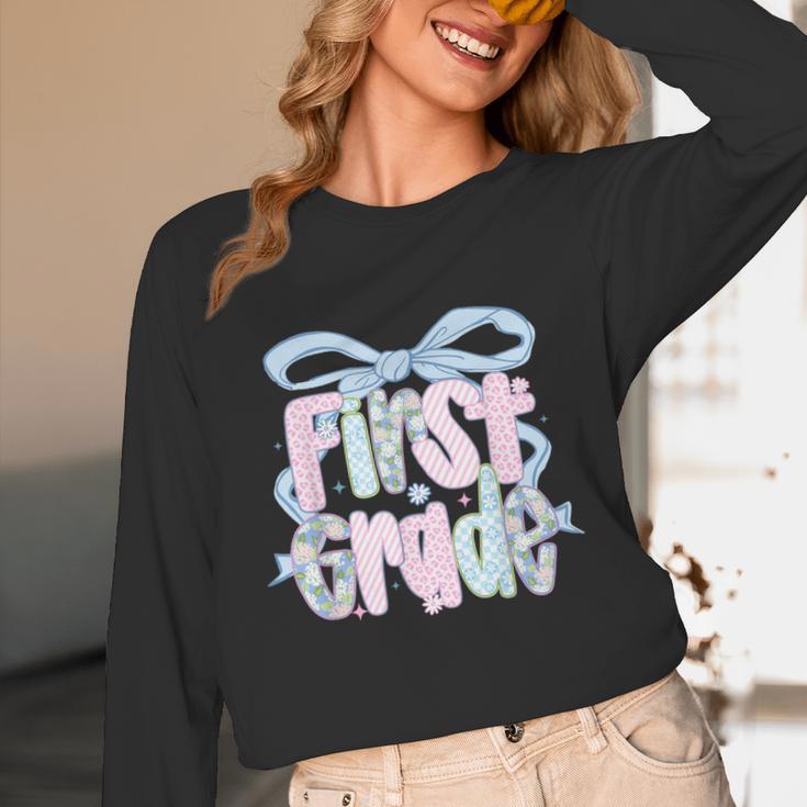 First Grade Coquette Bow Girls Teacher Team 1st Grade Squad Unisex Long Sleeve T-Shirt, funny design
