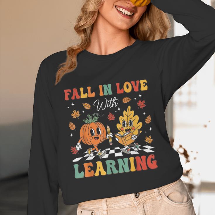 Groovy Fall In Love With Learning Autumn Pumpkin Teacher Unisex Long Sleeve T-Shirt, funny design Groovy Fall In Love With Learning Autumn Pumpkin Teacher Unisex Long Sleeve T-Shirt, funny design