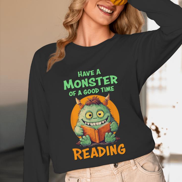 Halloween Teacher Librarian Monster Reading Books Men Women Kids Unisex Long Sleeve T-Shirt, funny design