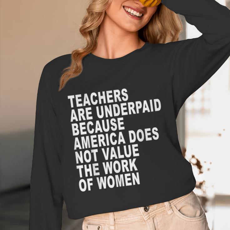 Teachers Are Underpaid Because America Does Not Value Men Women Unisex Long Sleeve T-Shirt, funny design Teachers Are Underpaid Because America Does Not Value Men Women Unisex Long Sleeve T-Shirt, funny design
