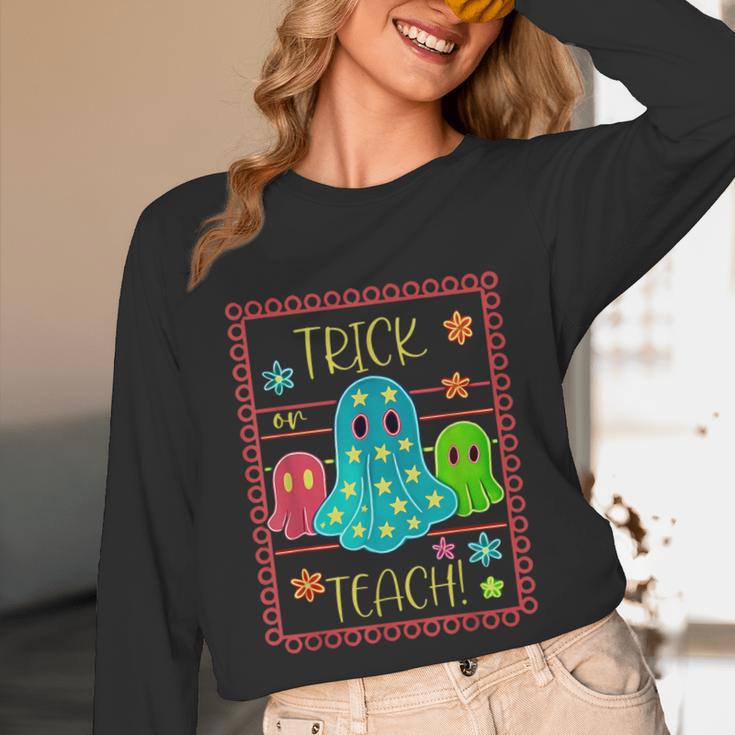 Trick Or Teach Neon Ghost Flower Teacher Spooky Halloween Unisex Long Sleeve T-Shirt, funny design