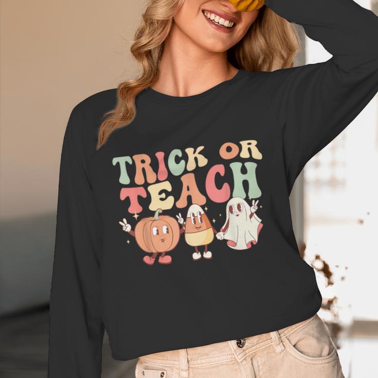 Trick Or Teach Pumpkin Candy Corn Ghost Halloween Teacher Unisex Long Sleeve T-Shirt, funny design Trick Or Teach Pumpkin Candy Corn Ghost Halloween Teacher Unisex Long Sleeve T-Shirt, funny design