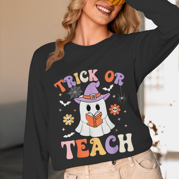 Trick Or Teach Teacher Groovy Ghost Halloween Teacher Unisex Long Sleeve T-Shirt, funny design