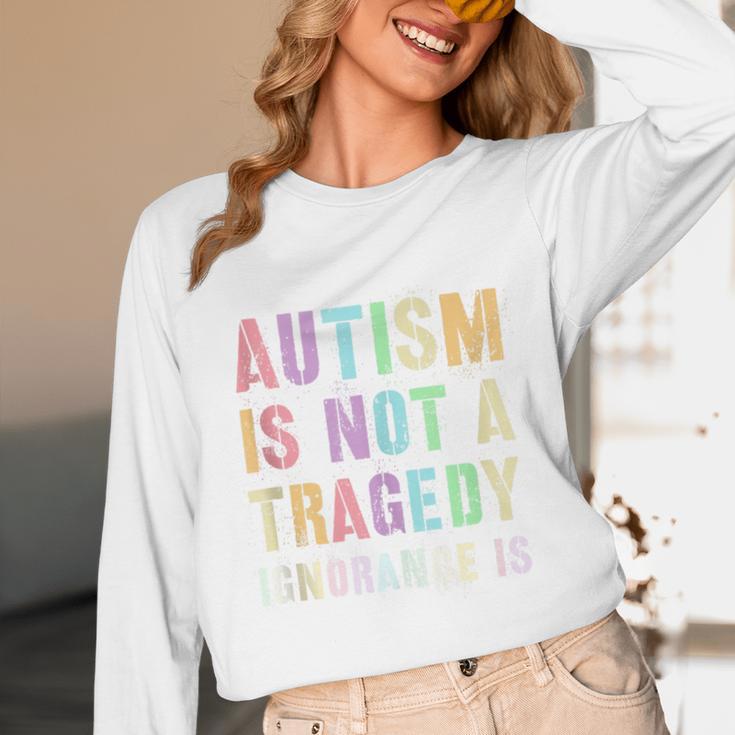 Kids AUTISM IS NOT A TRAGEDY IGNORANCE IS Proud Teacher Crew Unisex Long Sleeve T-Shirt, funny design Kids AUTISM IS NOT A TRAGEDY IGNORANCE IS Proud Teacher Crew Unisex Long Sleeve T-Shirt, funny design