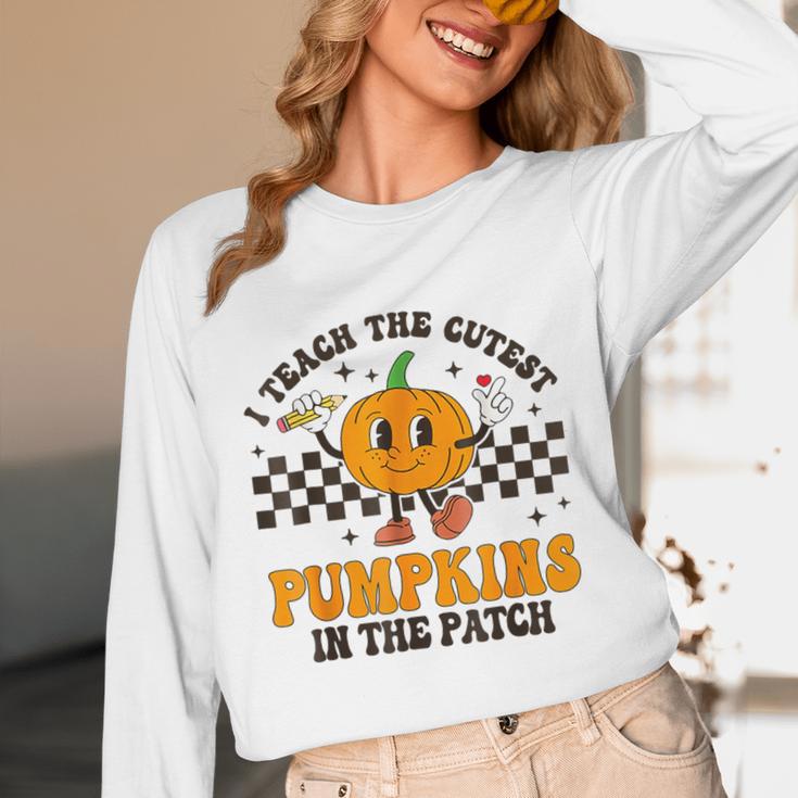 I Teach The Cutest Pumpkins In The Patch Groovy Teacher Fall Unisex Long Sleeve T-Shirt, funny design