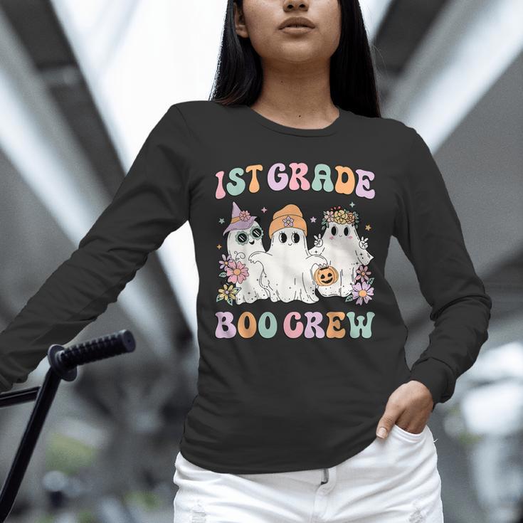 1st Grade Boo Crew Groovy Halloween Floral Ghost Kid Teacher Unisex Long Sleeve T-Shirt, novelty gifts, funny gifts 1st Grade Boo Crew Groovy Halloween Floral Ghost Kid Teacher Unisex Long Sleeve T-Shirt, novelty gifts, funny gifts
