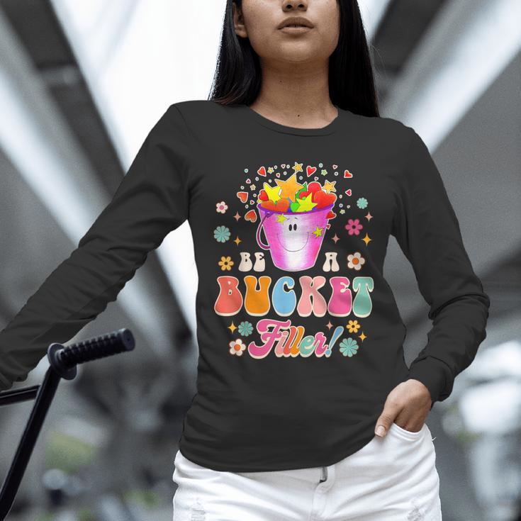 Be A Bucket Filler Teacher Teaching Groovy Back To School For Men Women Unisex Long Sleeve T-Shirt, novelty gifts, funny gifts Be A Bucket Filler Teacher Teaching Groovy Back To School For Men Women Unisex Long Sleeve T-Shirt, novelty gifts, funny gifts