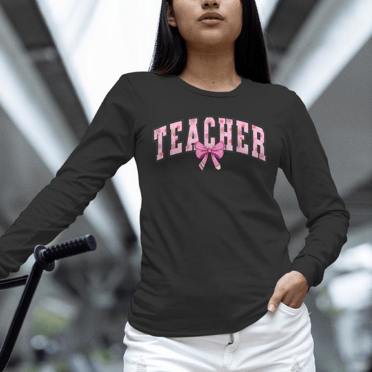 Coquette Bow Back To School First Day Teacher Unisex Long Sleeve T-Shirt, novelty gifts, funny gifts Coquette Bow Back To School First Day Teacher Unisex Long Sleeve T-Shirt, novelty gifts, funny gifts