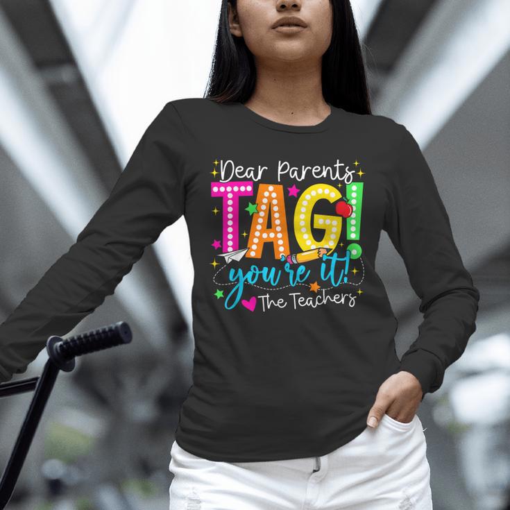 Dear Parents Tag You'Re It Love Teachers Last Day Of School Unisex Long Sleeve T-Shirt, novelty gifts, funny gifts Dear Parents Tag You'Re It Love Teachers Last Day Of School Unisex Long Sleeve T-Shirt, novelty gifts, funny gifts