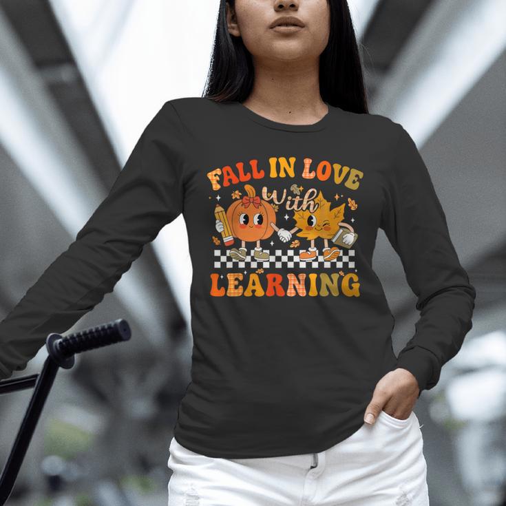 Fall In Love With Learning Autumn Pumpkin Fall Teacher Kids Unisex Long Sleeve T-Shirt, novelty gifts, funny gifts Fall In Love With Learning Autumn Pumpkin Fall Teacher Kids Unisex Long Sleeve T-Shirt, novelty gifts, funny gifts