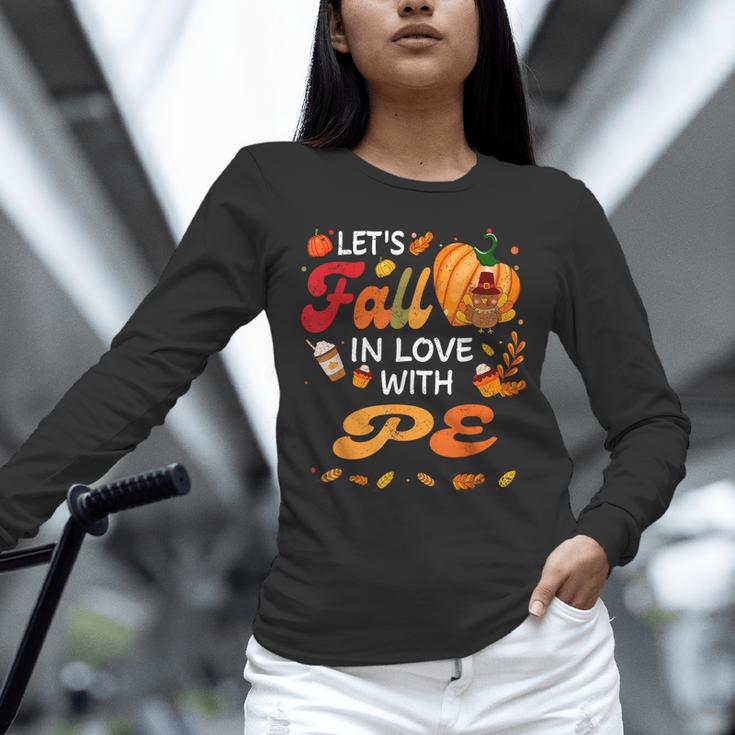 Lets Fall In Love With PE Teacher Thanksgiving Unisex Long Sleeve T-Shirt, novelty gifts, funny gifts Lets Fall In Love With PE Teacher Thanksgiving Unisex Long Sleeve T-Shirt, novelty gifts, funny gifts