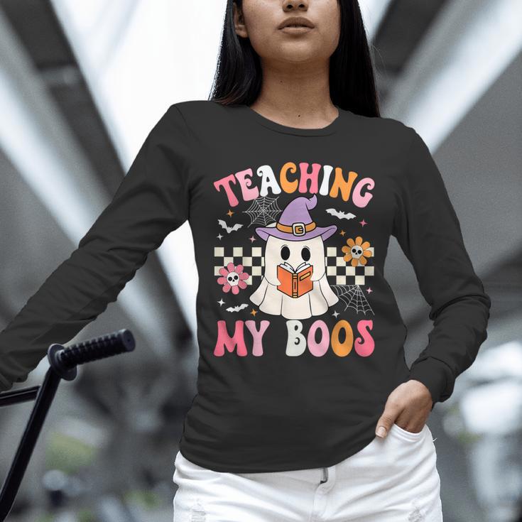 Groovy Teaching My Boos Teacher Ghost Halloween Teacher Unisex Long Sleeve T-Shirt, novelty gifts, funny gifts Groovy Teaching My Boos Teacher Ghost Halloween Teacher Unisex Long Sleeve T-Shirt, novelty gifts, funny gifts
