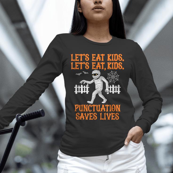 Halloween Lets Eat Kids Punctuation Teacher Unisex Long Sleeve T-Shirt, novelty gifts, funny gifts Halloween Lets Eat Kids Punctuation Teacher Unisex Long Sleeve T-Shirt, novelty gifts, funny gifts