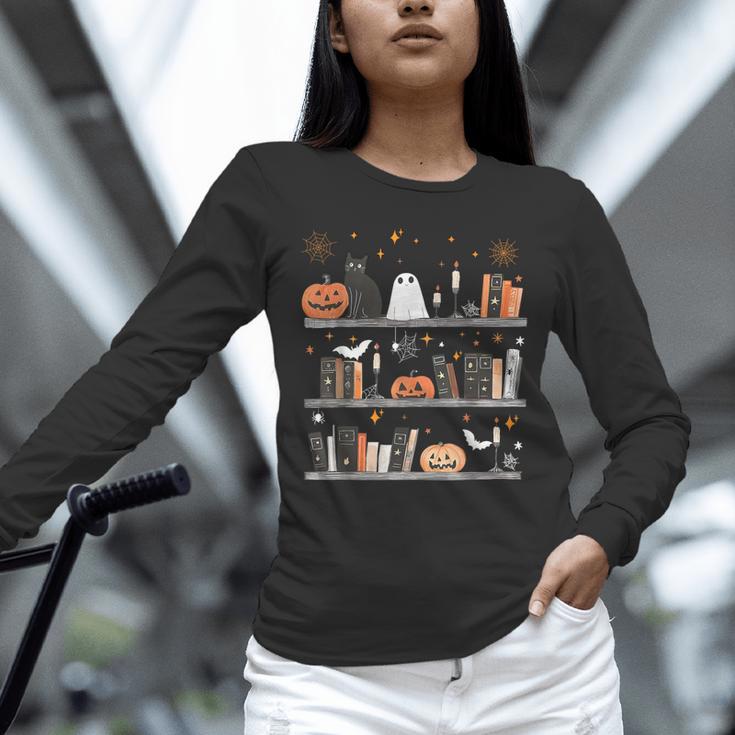 Halloween Library Ghost Books Teacher Spooky Trick Or Teach Unisex Long Sleeve T-Shirt, novelty gifts, funny gifts Halloween Library Ghost Books Teacher Spooky Trick Or Teach Unisex Long Sleeve T-Shirt, novelty gifts, funny gifts