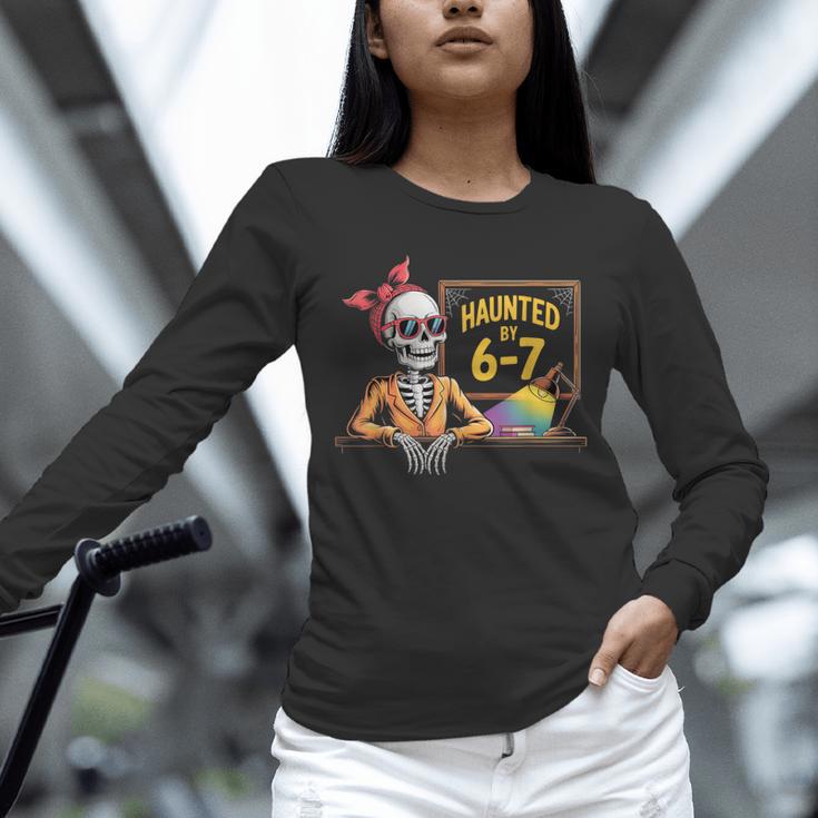 Haunted By 6-7 Teacher Halloween 67 Unisex Long Sleeve T-Shirt, novelty gifts, funny gifts
