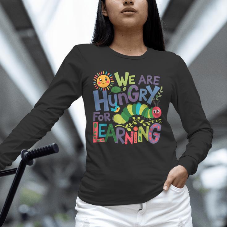 We Are Hungry For Learning Teacher Life Back To School Unisex Long Sleeve T-Shirt, novelty gifts, funny gifts We Are Hungry For Learning Teacher Life Back To School Unisex Long Sleeve T-Shirt, novelty gifts, funny gifts