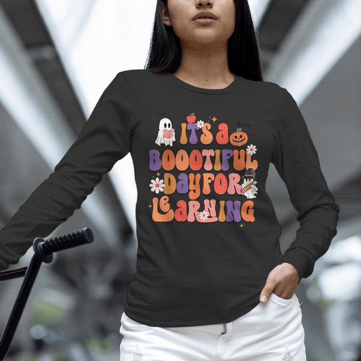 It's A Bootiful Day For Learning Cute Teacher Halloween Unisex Long Sleeve T-Shirt, novelty gifts, funny gifts It's A Bootiful Day For Learning Cute Teacher Halloween Unisex Long Sleeve T-Shirt, novelty gifts, funny gifts