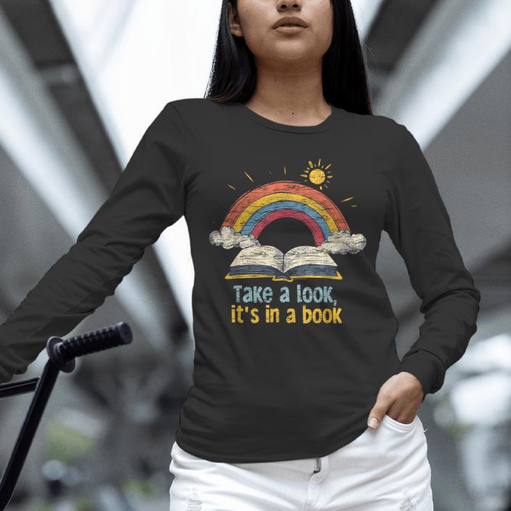 Take a Look It's In a Book Vintage Reading Teacher Rainbow Unisex Long Sleeve T-Shirt, novelty gifts, funny gifts