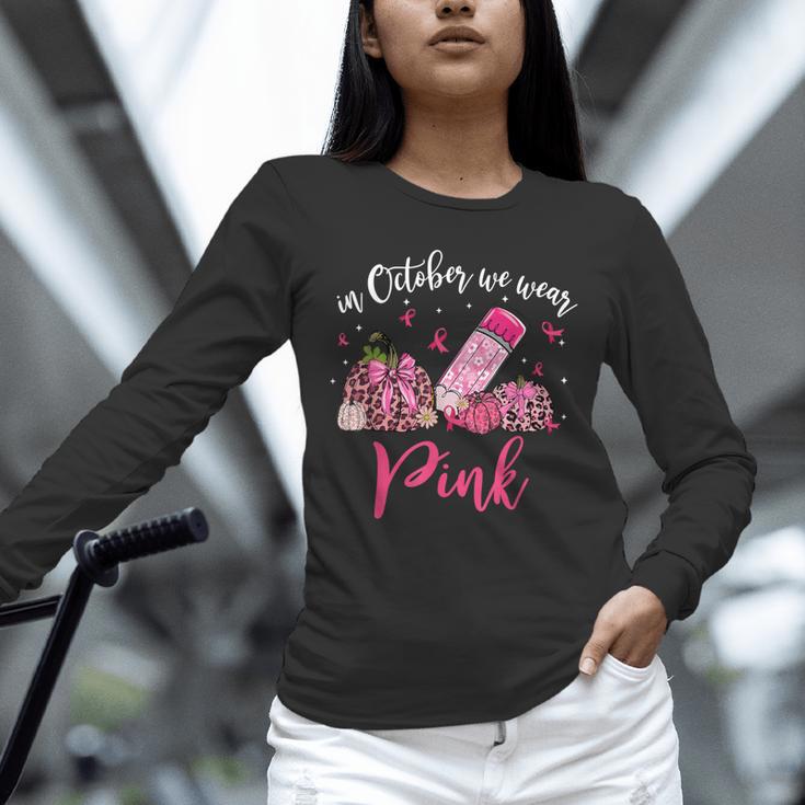In October We Wear Pink Apple Teacher Daisy Breast Cancer Unisex Long Sleeve T-Shirt, novelty gifts, funny gifts In October We Wear Pink Apple Teacher Daisy Breast Cancer Unisex Long Sleeve T-Shirt, novelty gifts, funny gifts