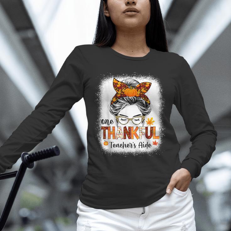 One Thankful Teacher's Aide Messy Bun Thanksgiving Fall Unisex Long Sleeve T-Shirt, novelty gifts, funny gifts One Thankful Teacher's Aide Messy Bun Thanksgiving Fall Unisex Long Sleeve T-Shirt, novelty gifts, funny gifts