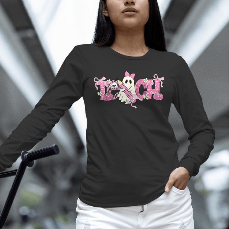 Pink Ghost Teach Halloween Teacher In Spooky Season Unisex Long Sleeve T-Shirt, novelty gifts, funny gifts