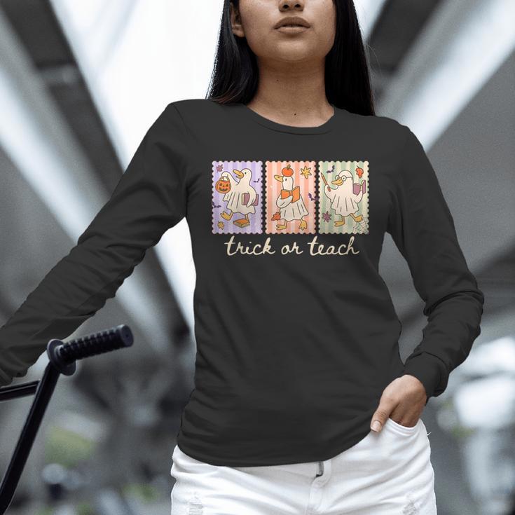 Preppy Goose Teacher Trick Or Teach Halloween Teacher Goose Unisex Long Sleeve T-Shirt, novelty gifts, funny gifts Preppy Goose Teacher Trick Or Teach Halloween Teacher Goose Unisex Long Sleeve T-Shirt, novelty gifts, funny gifts