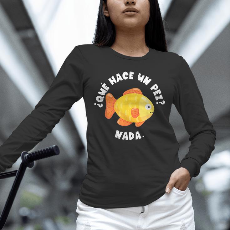 Que Hace Un Pez Nada Spanish Teacher Bilingual Teacher Dual Unisex Long Sleeve T-Shirt, novelty gifts, funny gifts Que Hace Un Pez Nada Spanish Teacher Bilingual Teacher Dual Unisex Long Sleeve T-Shirt, novelty gifts, funny gifts