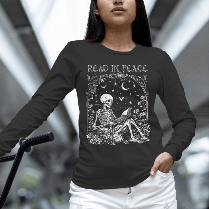 Read In Peace Skeleton Reading Teacher Spooky Halloween Unisex Long Sleeve T-Shirt, novelty gifts, funny gifts Read In Peace Skeleton Reading Teacher Spooky Halloween Unisex Long Sleeve T-Shirt, novelty gifts, funny gifts