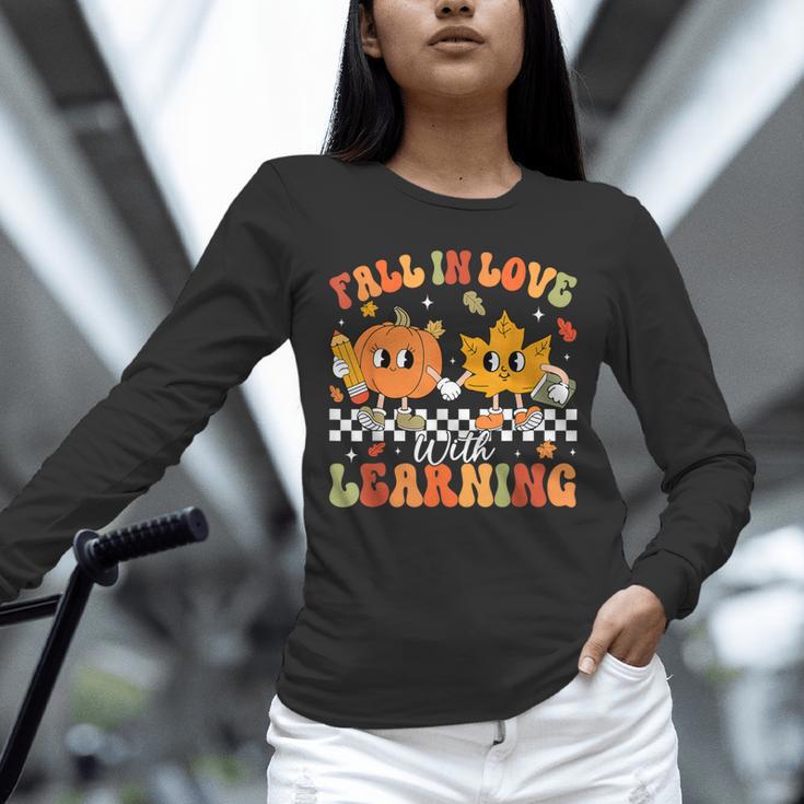 Retro Pumpkin Fall In Love With Learning Autumn Teacher Unisex Long Sleeve T-Shirt, novelty gifts, funny gifts Retro Pumpkin Fall In Love With Learning Autumn Teacher Unisex Long Sleeve T-Shirt, novelty gifts, funny gifts