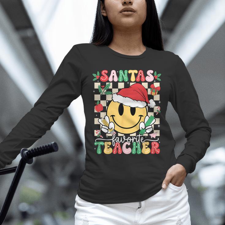 Santas Favorite Teacher Retro Groovy Smile Face Christmas Unisex Long Sleeve T-Shirt, novelty gifts, funny gifts Santas Favorite Teacher Retro Groovy Smile Face Christmas Unisex Long Sleeve T-Shirt, novelty gifts, funny gifts