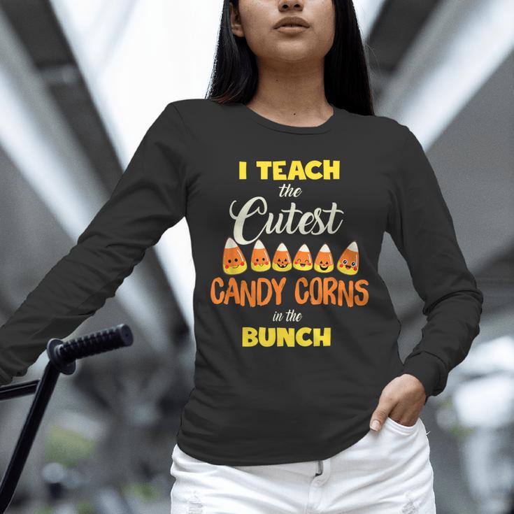 I Teach The Cutest Candy Corn In The Patch Teacher Halloween Unisex Long Sleeve T-Shirt, novelty gifts, funny gifts