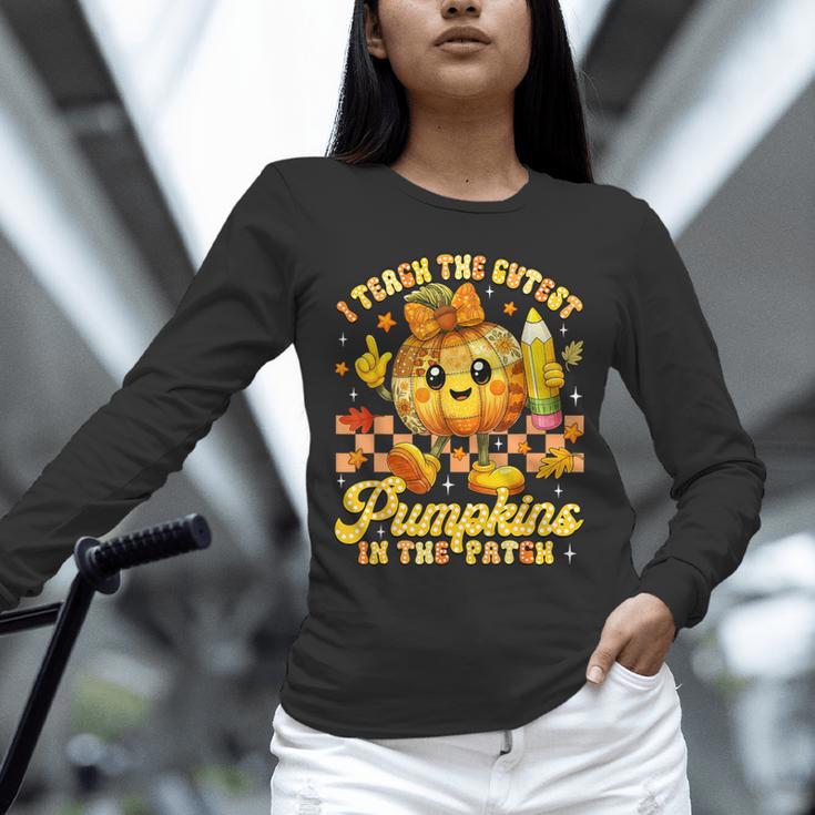 I Teach The Cutest Pumpkins In The Patch Teacher Halloween Unisex Long Sleeve T-Shirt, novelty gifts, funny gifts I Teach The Cutest Pumpkins In The Patch Teacher Halloween Unisex Long Sleeve T-Shirt, novelty gifts, funny gifts
