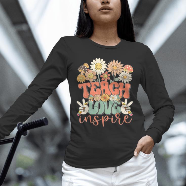 Teach Love Inspire Retro Groovy Daisy Back To School Teacher For Men Women Kids Unisex Long Sleeve T-Shirt, novelty gifts, funny gifts
